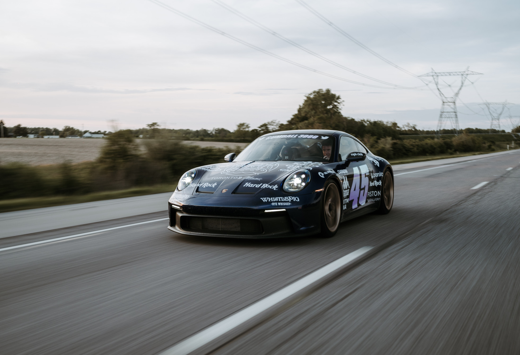 Porsche 911 GT3 Touring at speed during the Gumball 3000